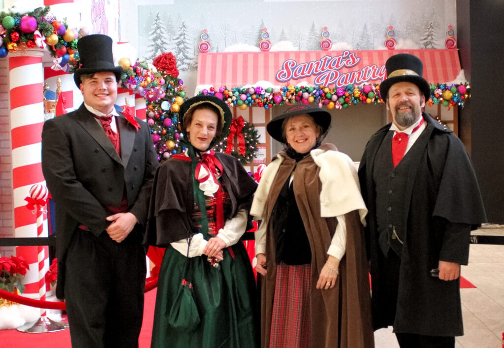 Goodrich Caroling's founding company The Caroling Connection at Santa's Pantry in Block 37